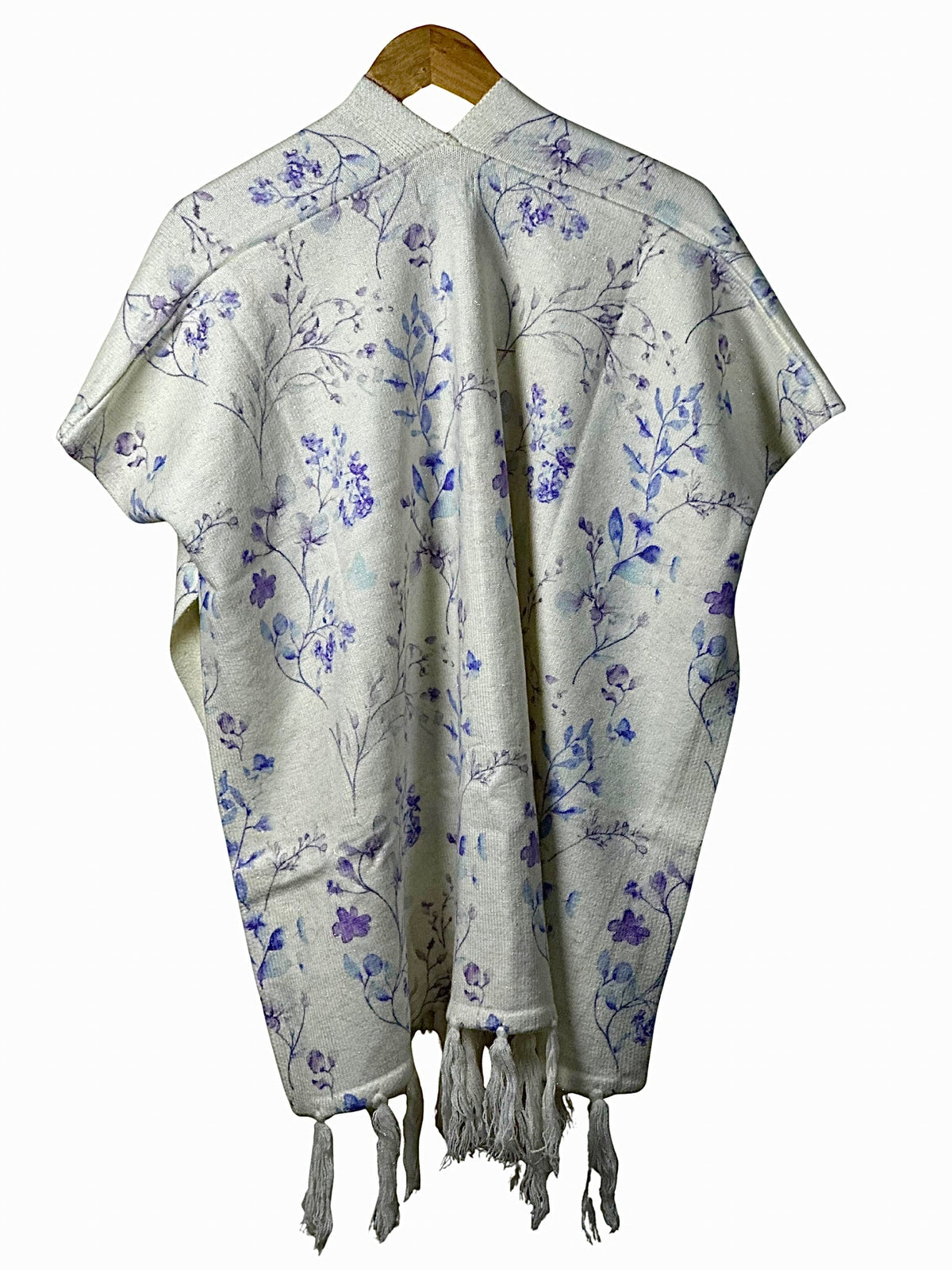 Cozy&Drape floral print cape shawl in cream with purple botanical patterns and tassel hem for winter warmth