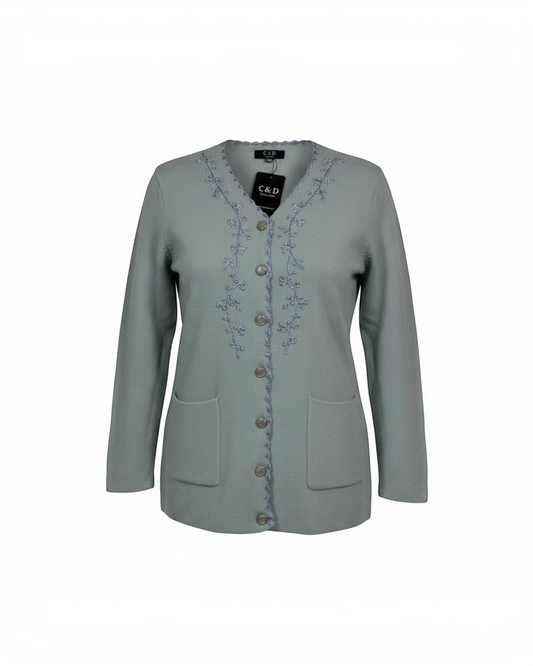 Cozy&Drape sage green button-up cardigan featuring delicate floral embroidery, full sleeves, and two front pockets.