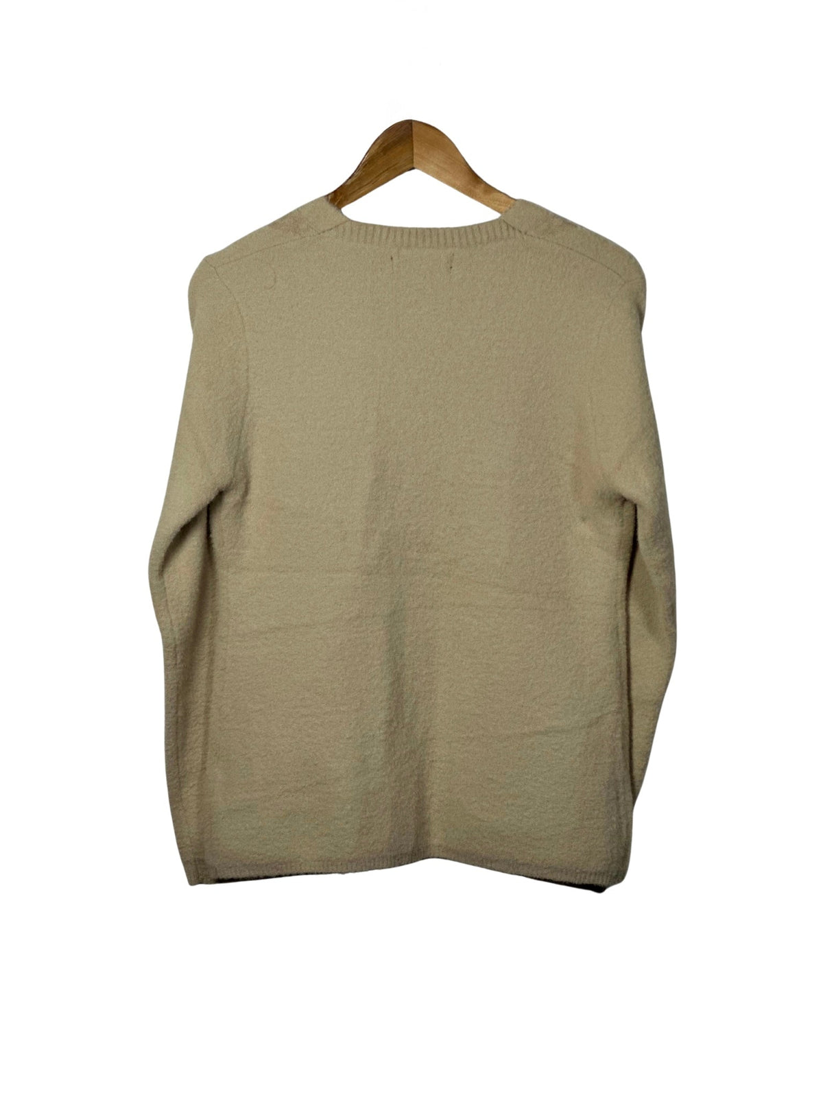 Cozy&Drape beige full sleeve cardigan sweater with a soft textured knit finish hanging on a wooden hanger