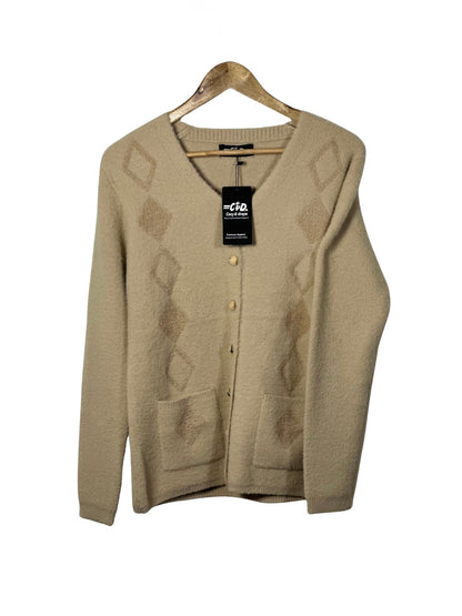 Cozy&Drape beige full sleeve cardigan sweater with diamond pattern, front buttons, and pockets on a wooden hanger.