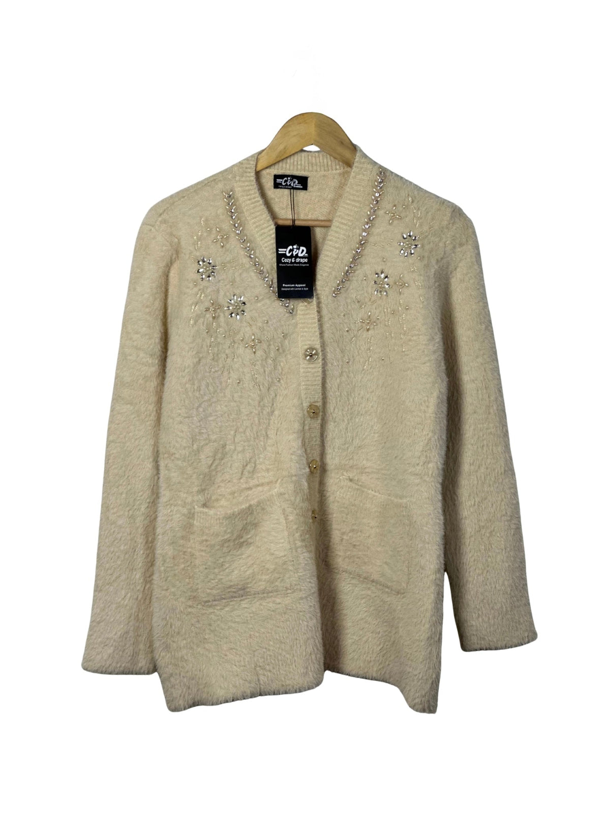 Cozy&Drape beige full sleeve cardigan sweater with front pockets and decorative crystal embellishments on the neckline