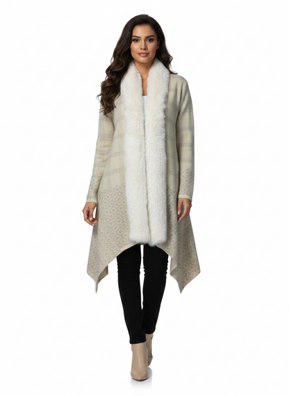 Model wearing a Cozy&Drape beige patterned knit cardigan with a luxurious white faux fur collar and asymmetrical hem.