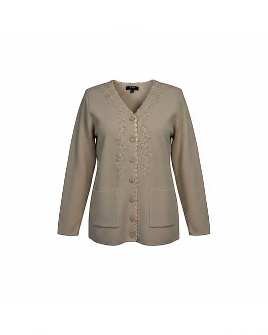 Cozy&Drape beige knit cardigan with V-neck, floral embroidery along the placket, button front, and two front pockets.