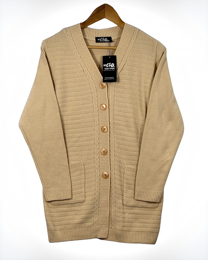 Cozy&Drape beige long cardigan sweater with a button-up front, ribbed texture, and two convenient front pockets.