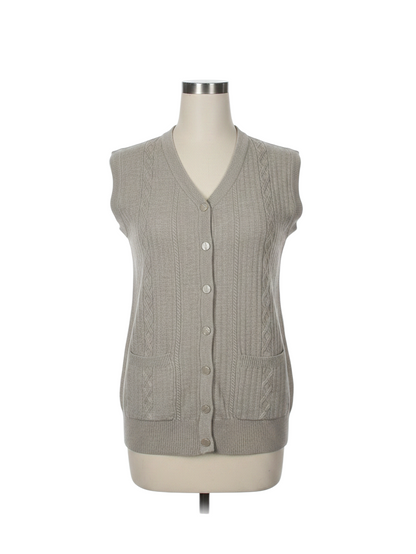Cozy&Drape beige sleeveless cable-knit cardigan vest with a V-neck, button-up front, and two front pockets.