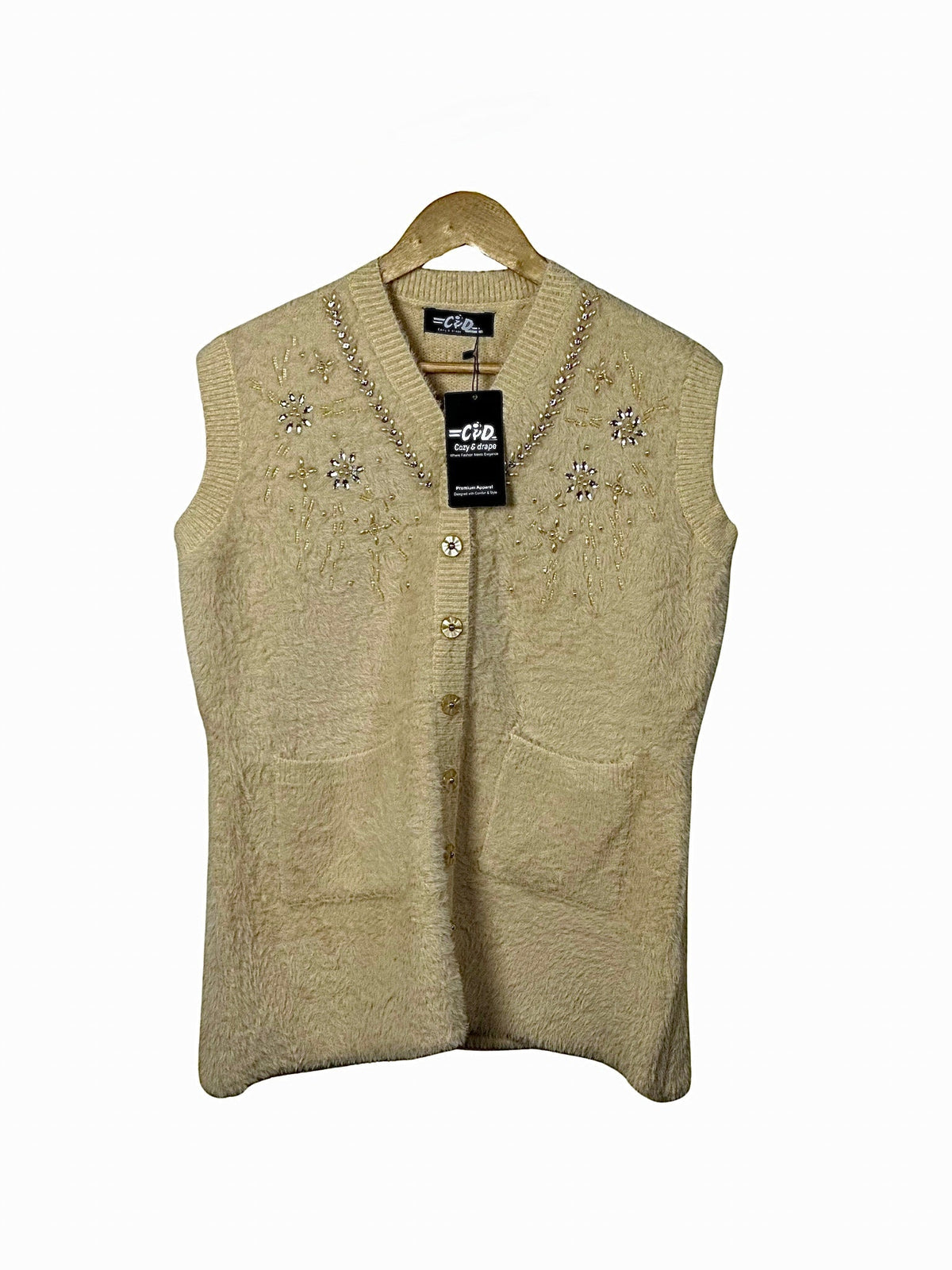 Cozy&Drape sleeveless knit cardigan in beige with V-neck, shimmering beadwork, embroidery, and front button closure.