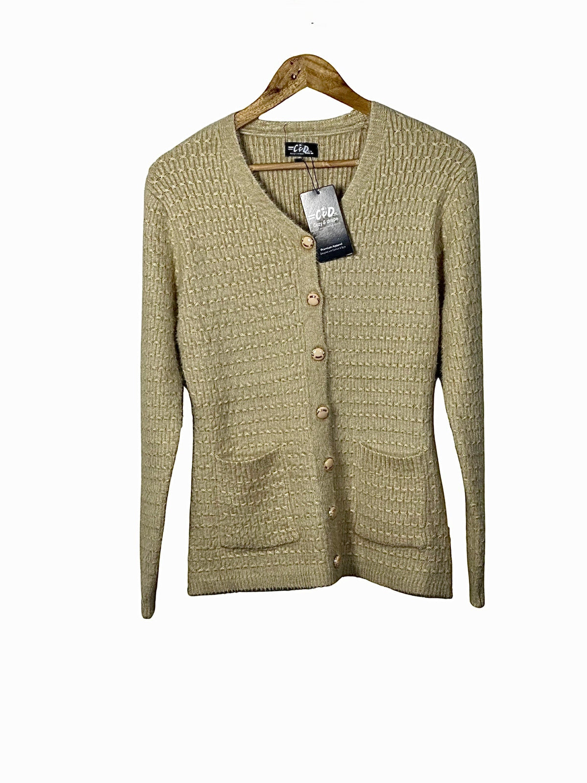 Cozy&Drape beige textured full sleeve cardigan sweater with button front and two pockets on a wooden hanger