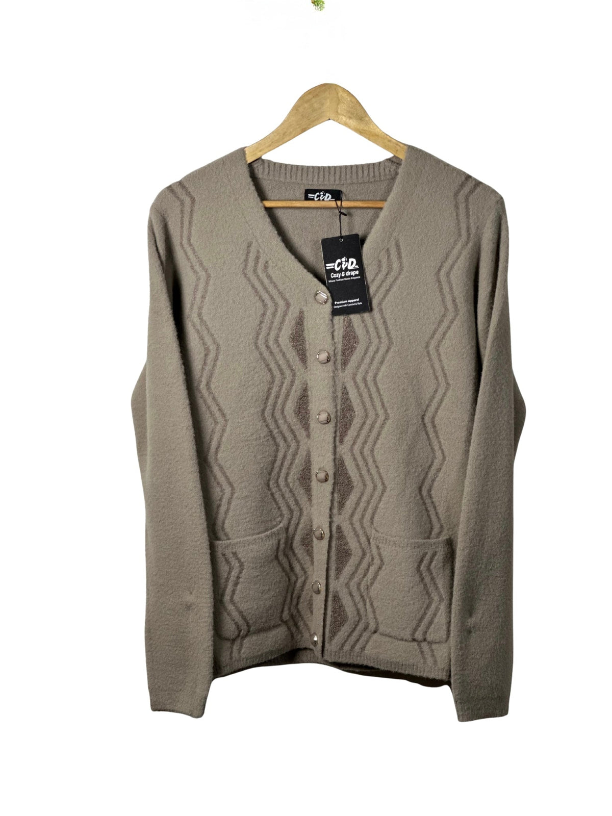 Cozy&Drape beige full sleeve cardigan sweater with a textured geometric pattern, button front, and two pockets.