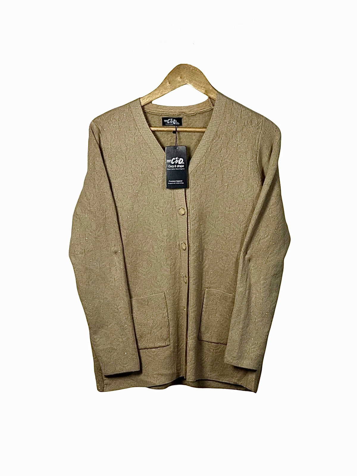 Cozy&Drape beige wool cardigan sweater with long sleeves, front buttons, and pockets hanging on a wooden hanger