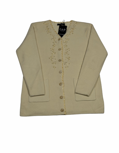 Cozy&Drape beige wool cardigan with floral embroidery, front buttons, and pockets for a soft, elegant layered look.