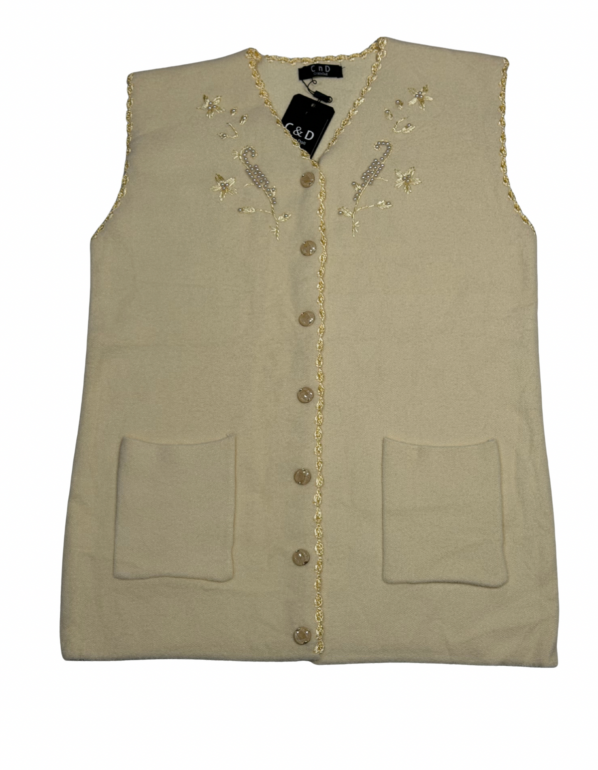 Cozy&Drape sleeveless wool cardigan in beige with front button closure, pockets, and delicate floral embroidery.