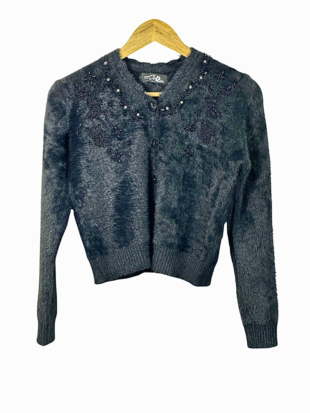Cozy&Drape extra short black fuzzy cardigan sweater with intricate beaded floral embroidery on the neckline