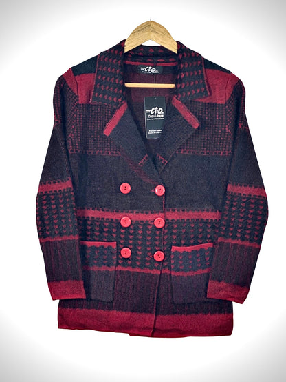 Cozy&Drape short cardigan sweater coat in black and red with a geometric pattern, double-breasted buttons, and pockets