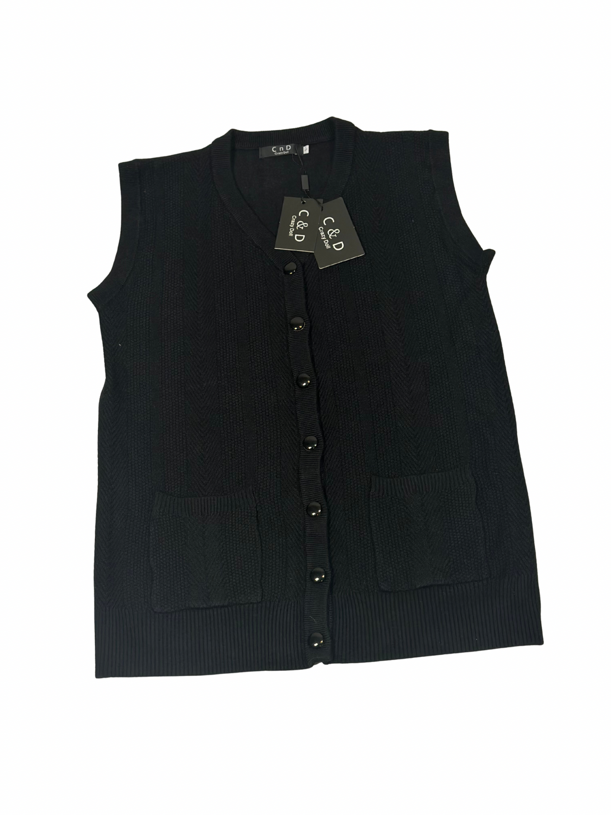 Cozy&Drape black sleeveless wool cardigan sweater with a button-up front and two patch pockets.