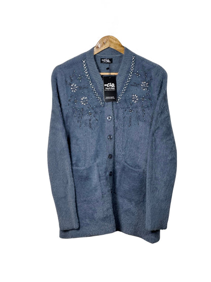Cozy&Drape blue full-sleeve cardigan sweater with front pockets and delicate floral beadwork on the neckline.