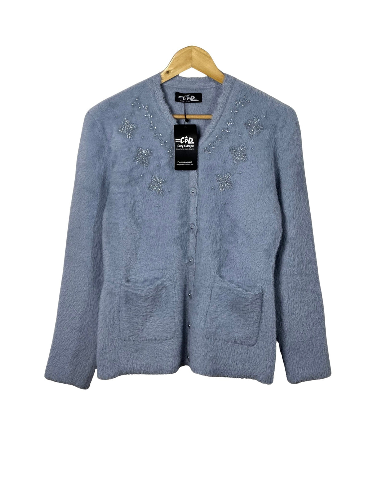 Cozy&Drape light blue fuzzy cardigan sweater with beaded floral embroidery, front pockets, and button-up closure.