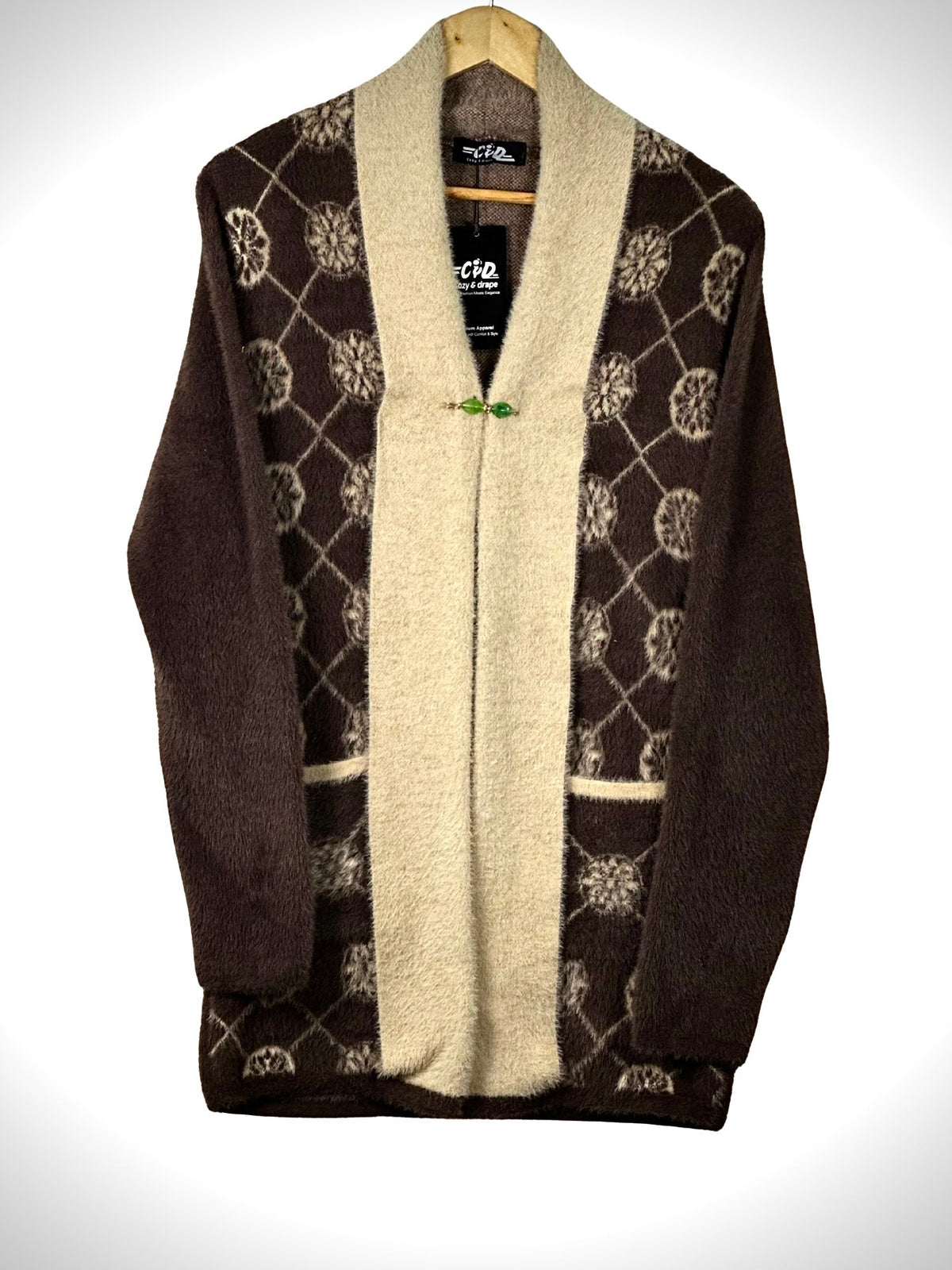 Cozy&Drape open front sweater in brown and cream with a geometric floral pattern and convenient front pockets.