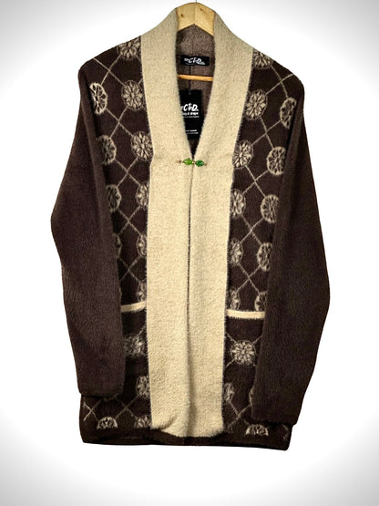 Cozy&Drape open front sweater in brown and cream with a geometric floral pattern and convenient front pockets.