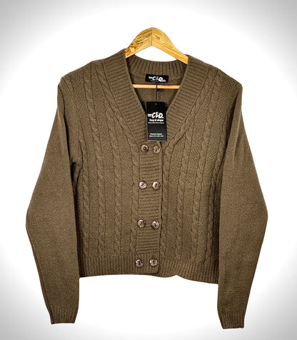 Cozy&Drape extra short brown cable knit cardigan sweater with a V-neck and four button closure on a wooden hanger