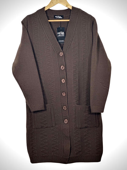Cozy&Drape long-line brown knit cardigan with V-neck, button-front closure, and two front pockets on a wooden hanger.