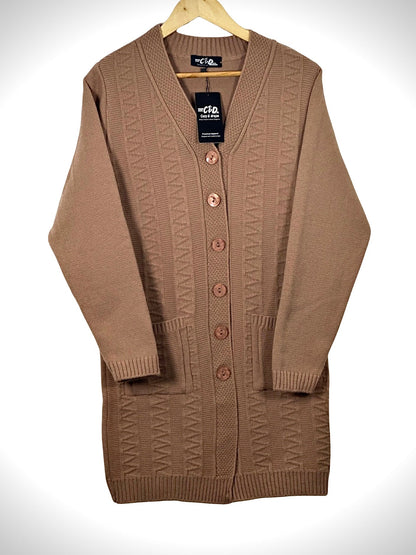 Cozy&Drape long-line tan knit cardigan with V-neck, button front, and two front pockets on a wooden hanger.
