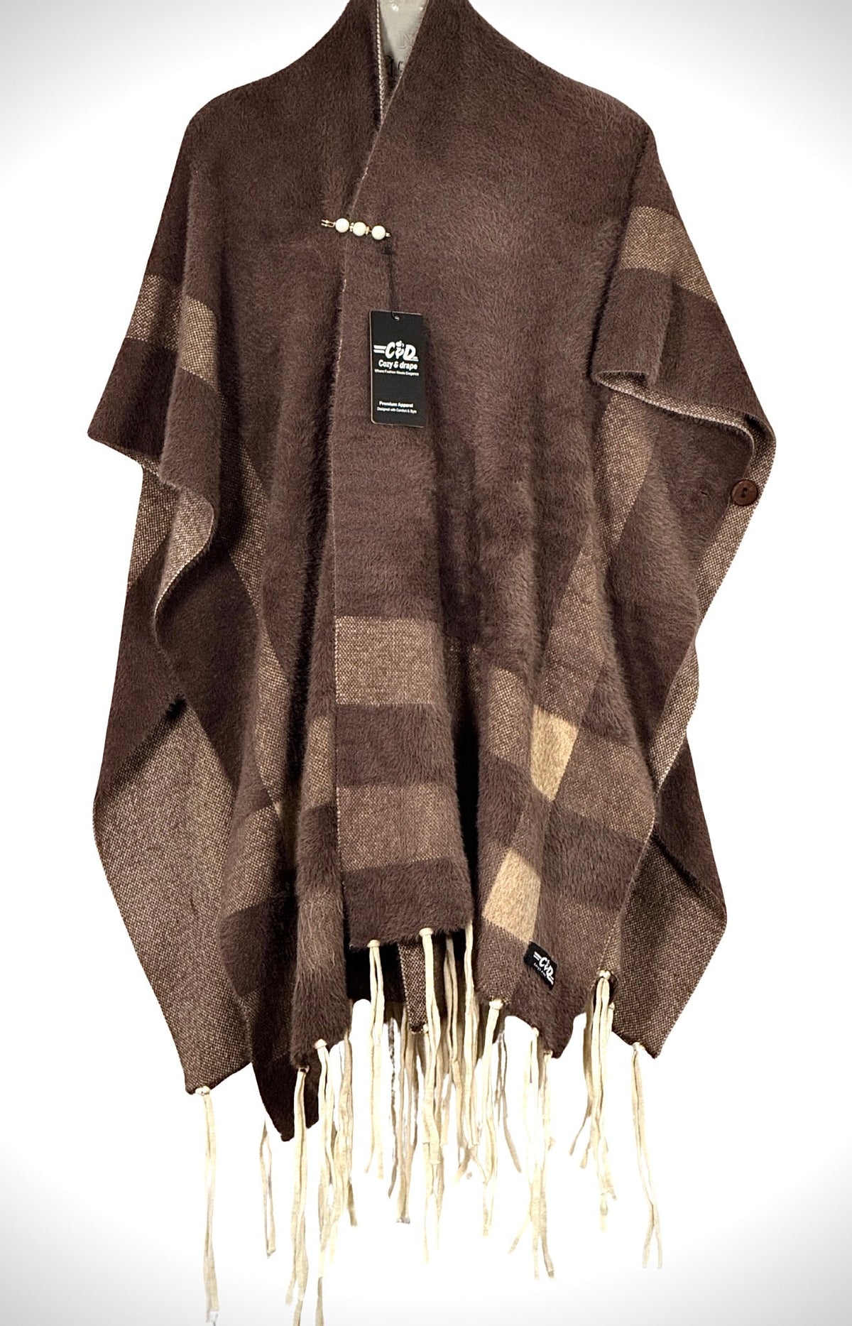 Cozy&Drape brown plaid winter cape shawl with fringe hem and decorative pin closure for elegant warmth