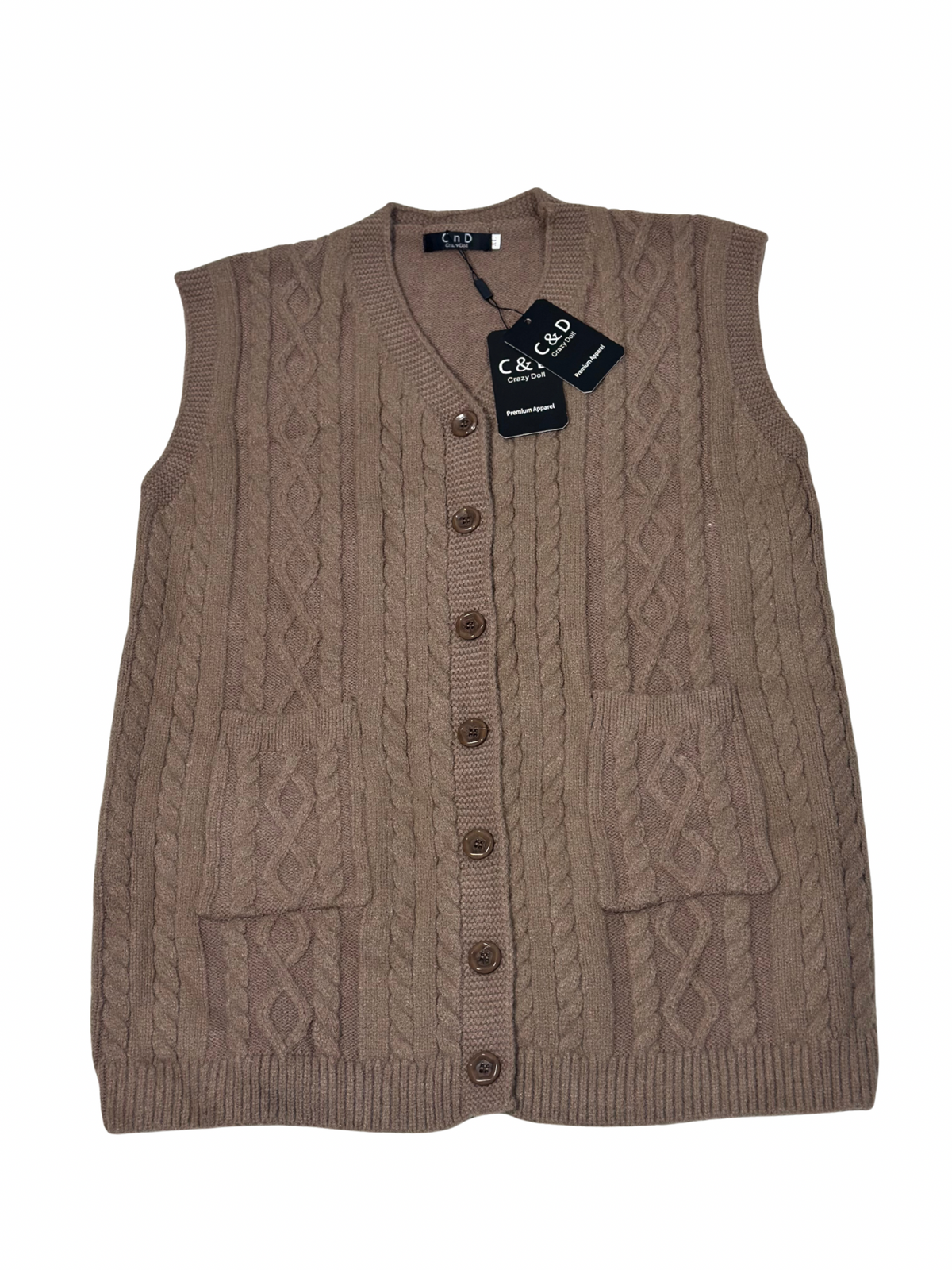 Cozy&Drape sleeveless wool cardigan sweater in brown with cable knit texture, front buttons, and two patch pockets.