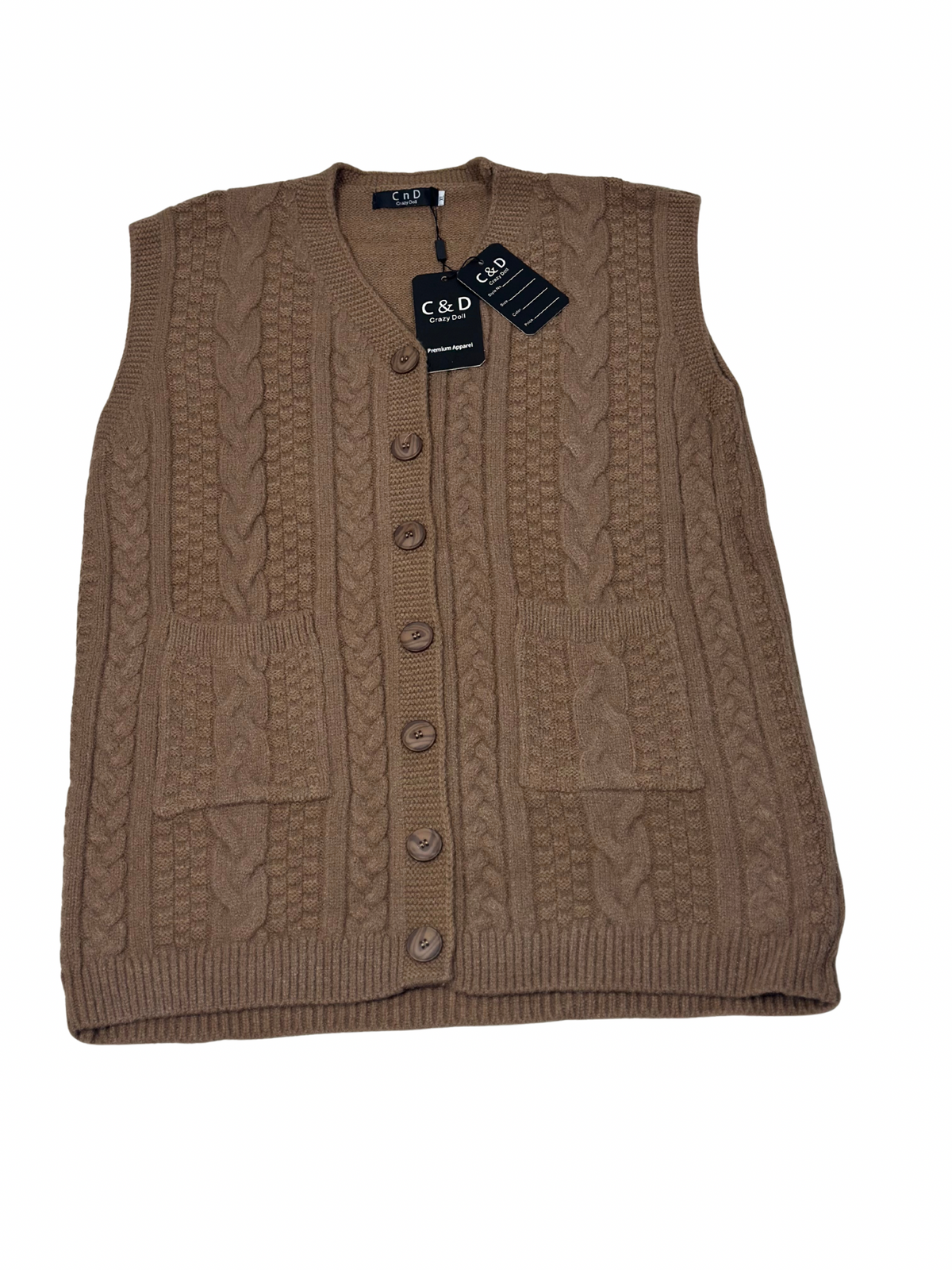 Cozy&Drape brown wool sleeveless cardigan sweater with cable knit texture, front buttons, and two patch pockets.