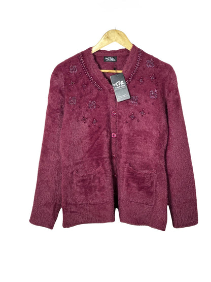 Cozy&Drape burgundy fuzzy knit cardigan sweater with beaded floral embroidery and front pockets on a wooden hanger