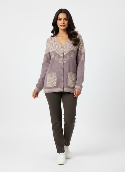 Cozy&Drape button-up knit cardigan with V-neck, floral and geometric patterns, and front pockets on a female model.