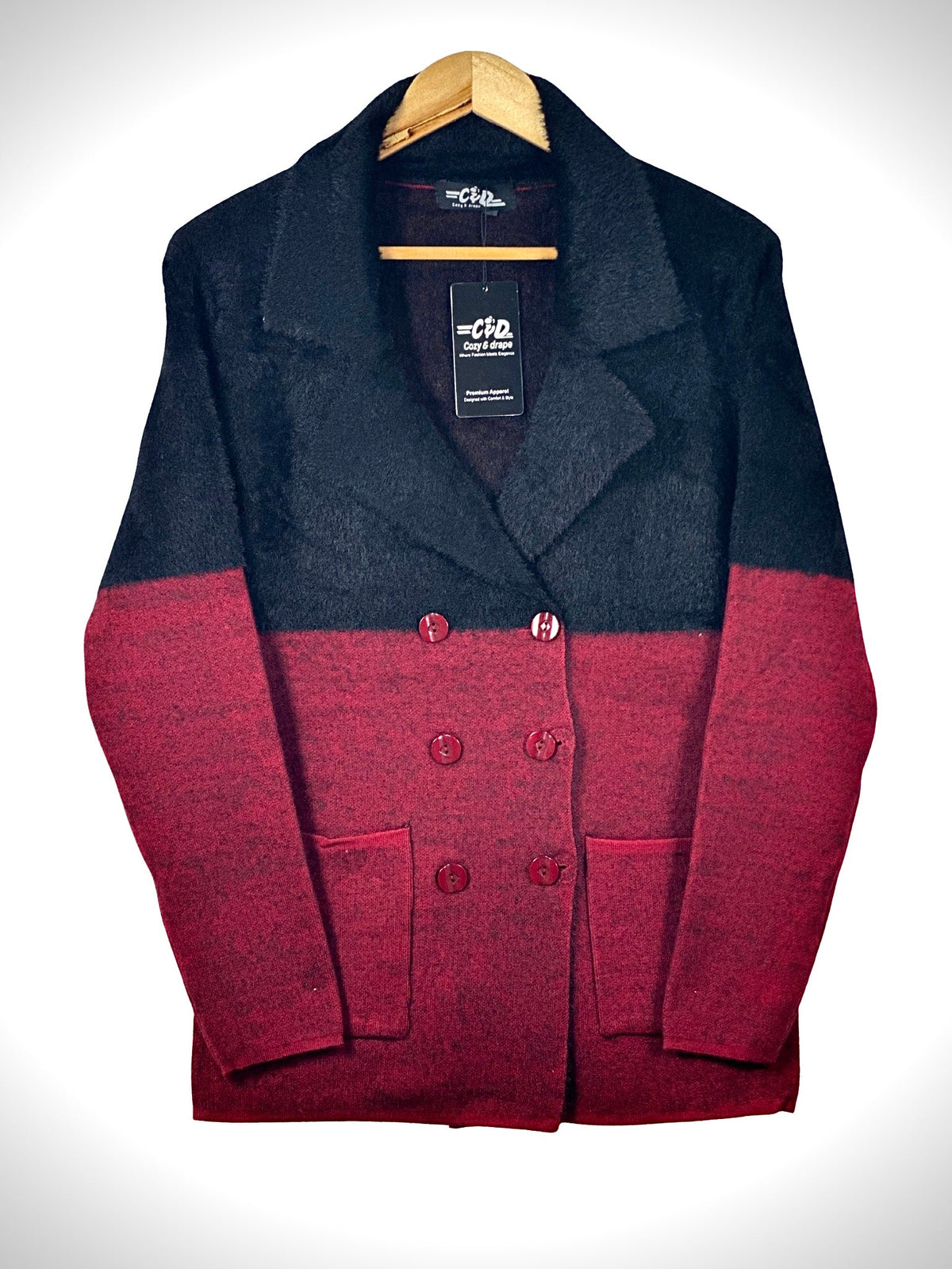 Cozy&Drape double-breasted knit blazer in black and red color-block with notched lapels and two front patch pockets.