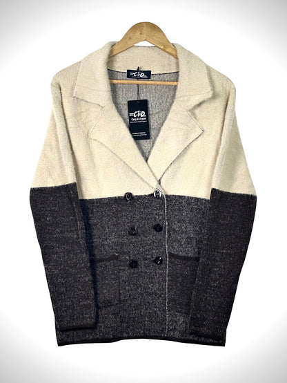 Cozy&Drape double-breasted knit blazer jacket in a cream and charcoal color-blocked design with patch pockets.