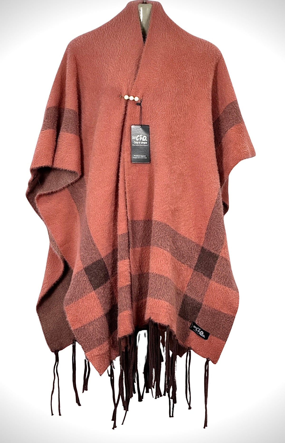 Cozy&Drape coral and brown plaid winter cape shawl with fringe trim and pearl-accented clasp