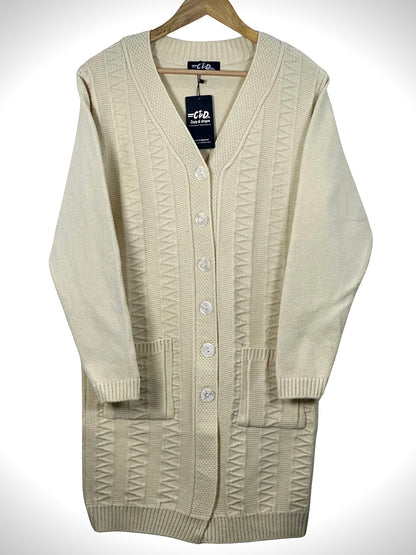 Cozy&Drape cream long-line knit cardigan with a V-neck, button-front closure, and two front pockets on a hanger.