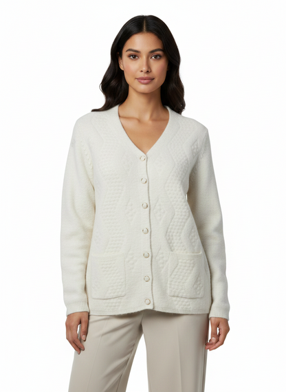 Cozy&Drape cream textured knit V-neck button-down cardigan with front pockets worn by a woman