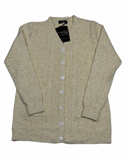 Cozy&Drape cream wool cardigan sweater with a button-up front, cable knit texture, and two convenient front pockets.