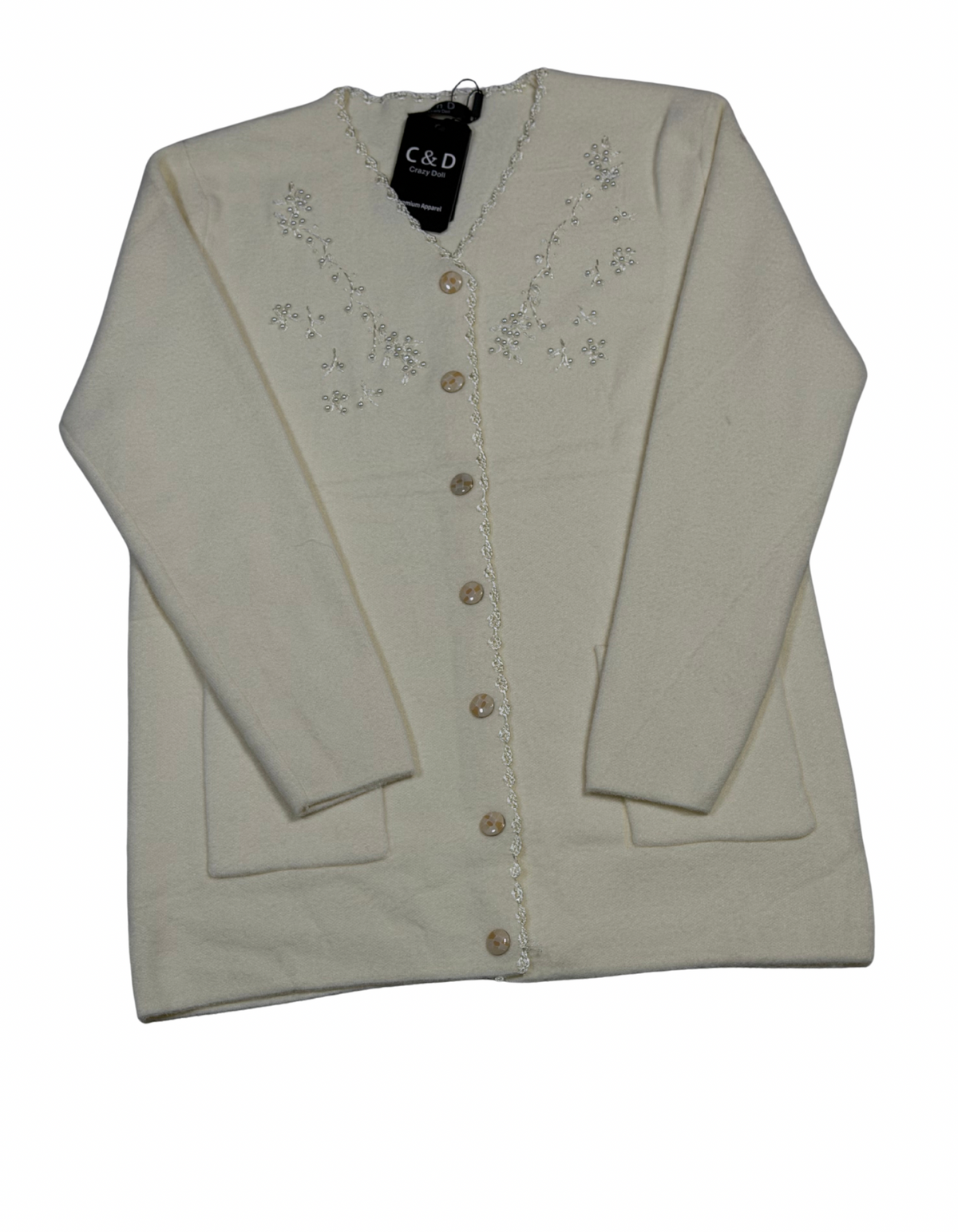Cozy&Drape cream wool cardigan with long sleeves, front buttons, pockets, and delicate floral embroidery detail