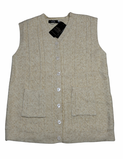 Cozy&Drape sleeveless wool cardigan sweater in cream with cable knit texture, front buttons, and two patch pockets.