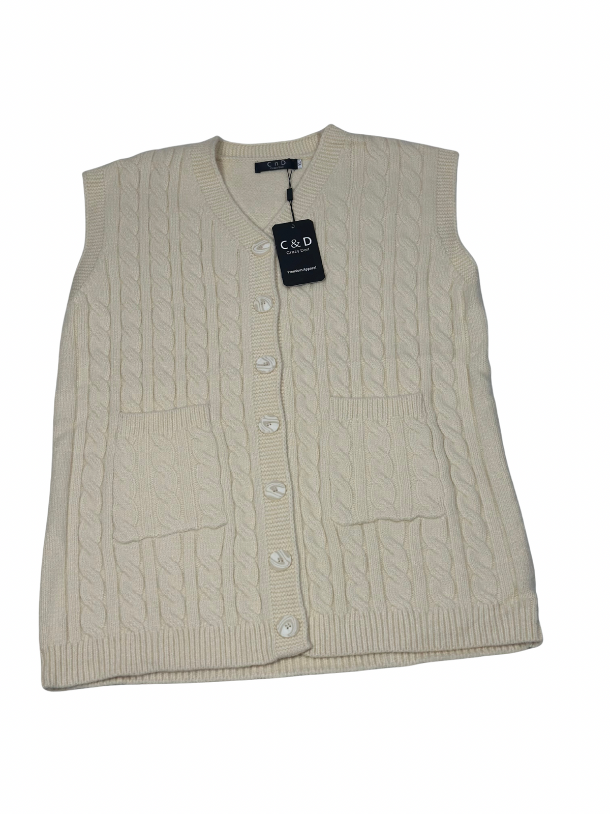 Cozy&Drape sleeveless cream wool cardigan sweater with cable knit pattern, front buttons, and two patch pockets.