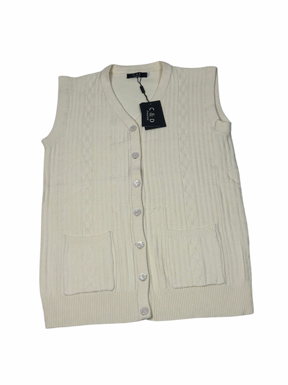 Cozy&Drape sleeveless wool cardigan sweater in cream with cable knit texture, front buttons, and two patch pockets.