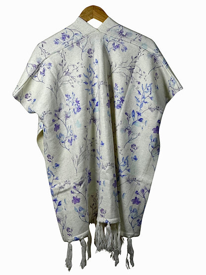 Cozy&Drape floral print cape shawl in cream with purple botanical patterns and tassel hem for winter warmth