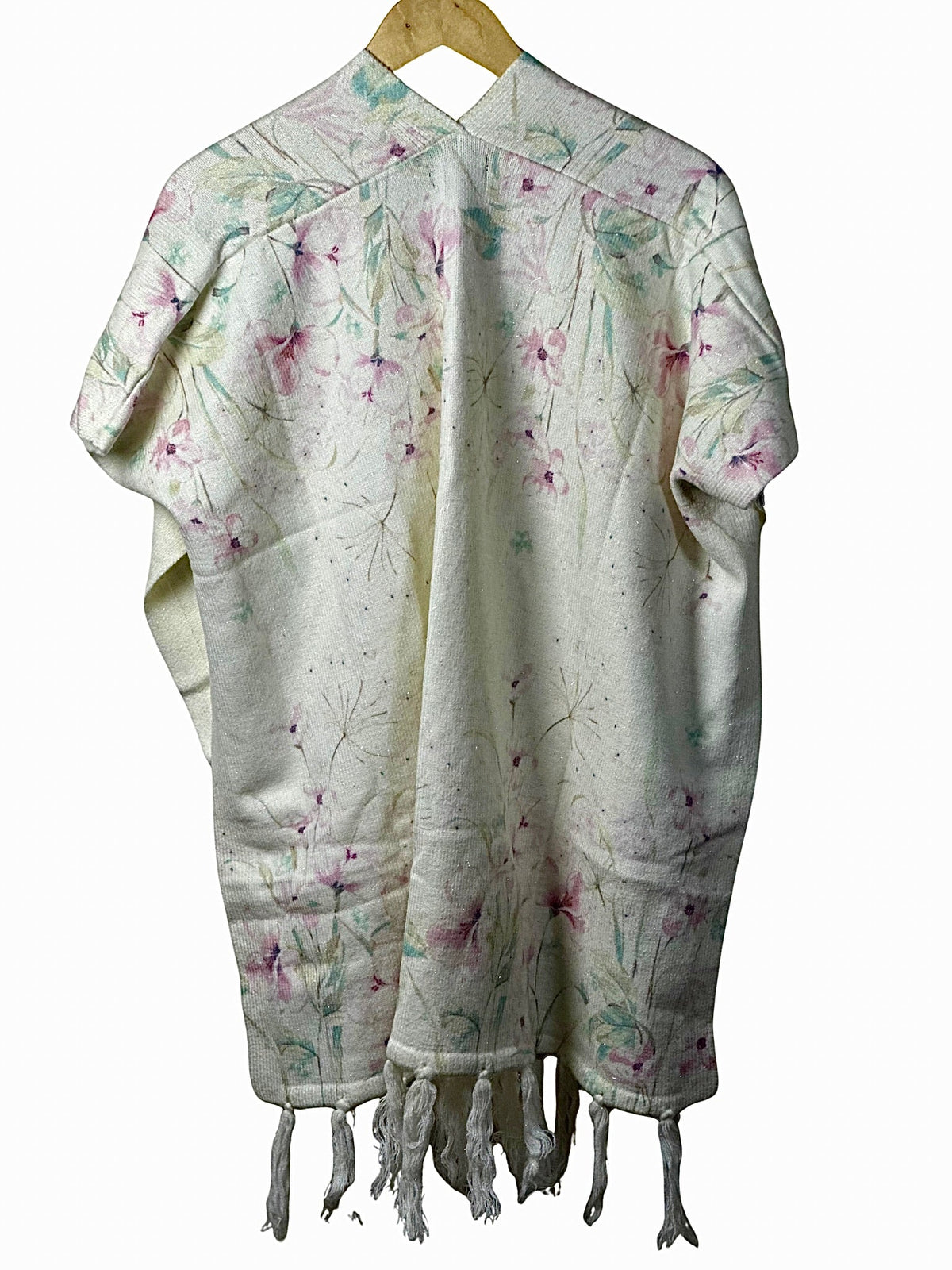 Cozy&Drape floral print winter cape shawl in cream with delicate pink and green flowers and tassel hem detail