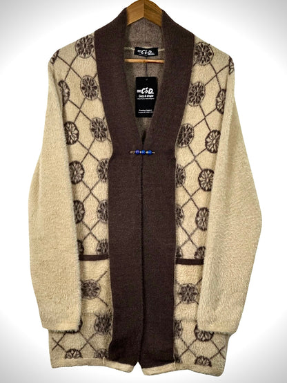 Cozy&Drape open front sweater in beige and brown with a diamond floral pattern and convenient front pockets.