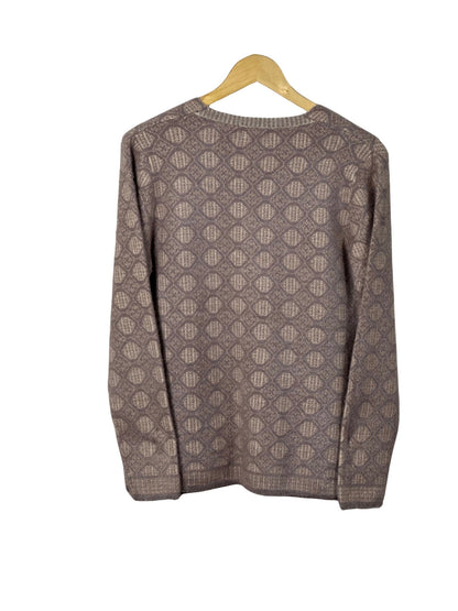 Cozy&Drape long sleeve cardigan sweater in a taupe and beige geometric diamond pattern on a wooden hanger