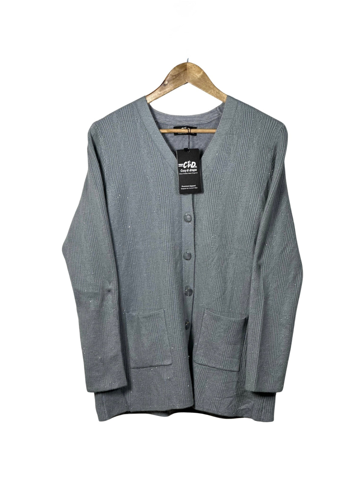 Cozy&Drape grey full sleeve cardigan sweater with front pockets and button-down front on a wooden hanger