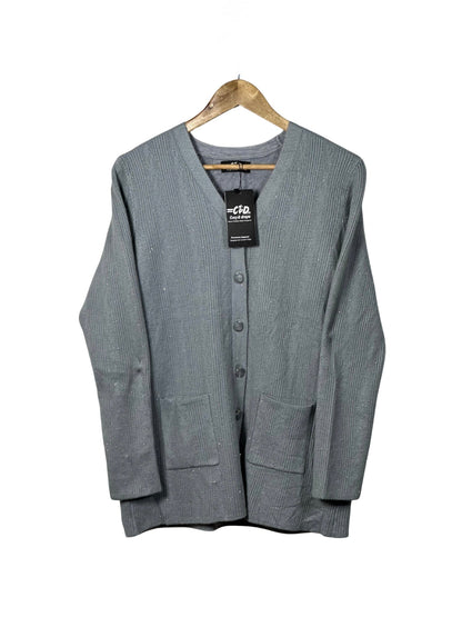 Cozy&Drape grey full sleeve cardigan sweater with front pockets and button-down front on a wooden hanger