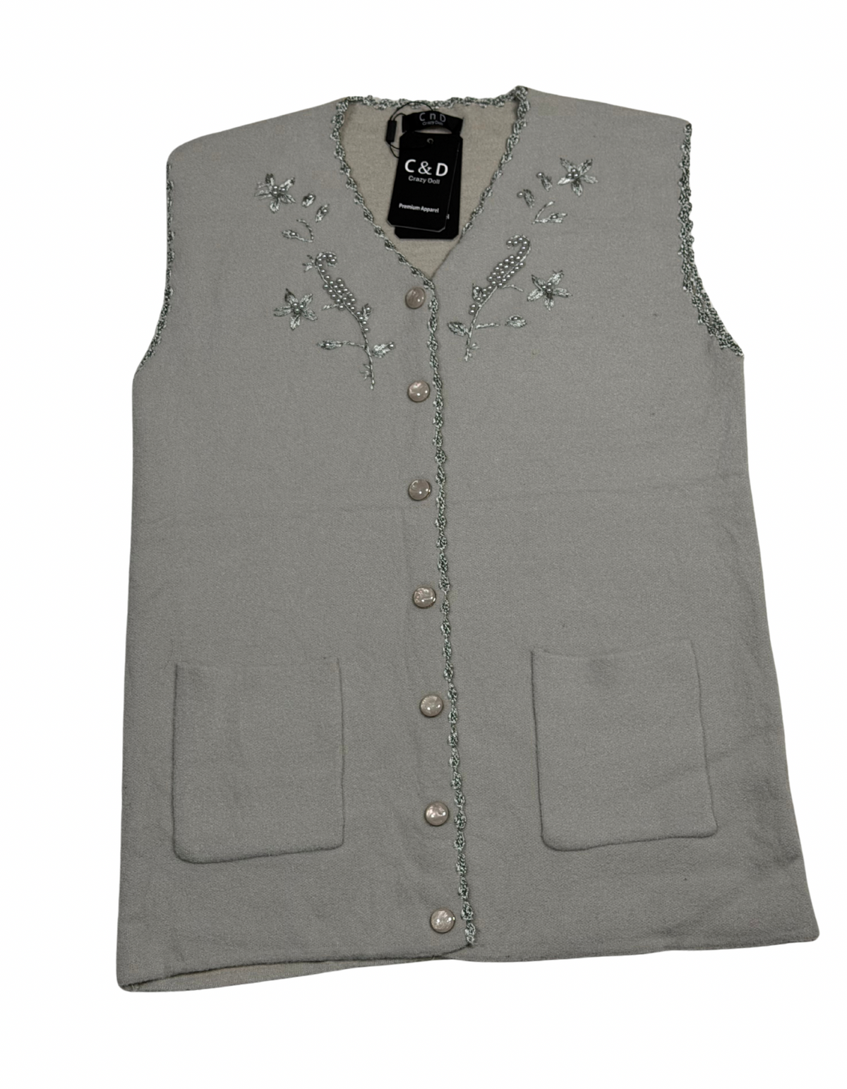 Cozy&Drape sleeveless wool cardigan in grey with floral beadwork, front buttons, and two patch pockets.