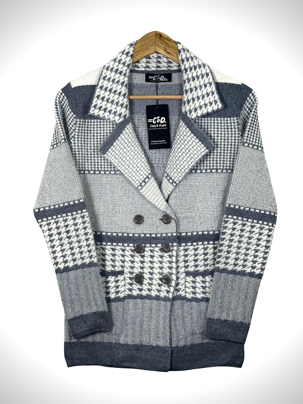 Cozy&Drape short cardigan sweater coat featuring a grey and white houndstooth pattern and double-breasted buttons.