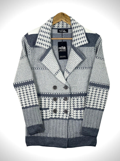 Cozy&Drape short cardigan sweater coat featuring a grey and white houndstooth pattern and double-breasted buttons.