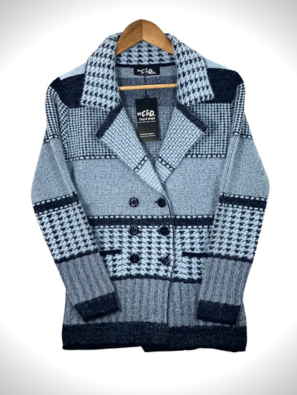 Cozy&Drape short cardigan sweater coat in light blue and navy with a houndstooth pattern and double-breasted buttons.